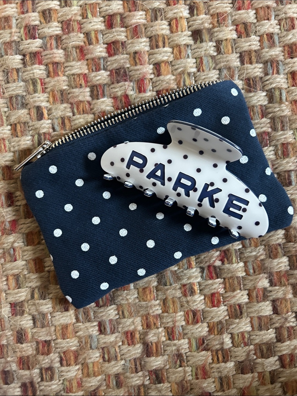 Parke Polka Dot White Hair Clip with Navy Lettering and Navy Polka Dots.